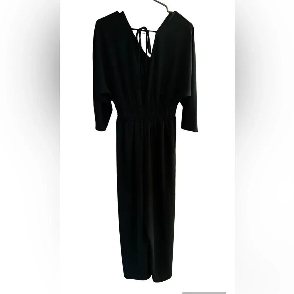 Bebop women’s hunter green pantsuit with tie in back. Size large